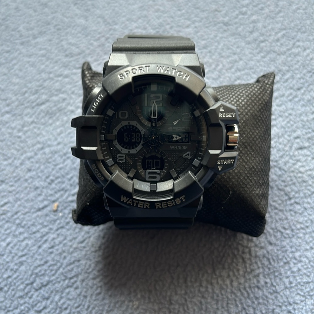 Men’s analog/ digital watch—
